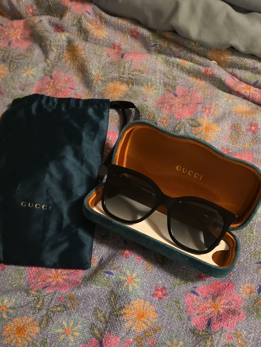 Gucci Black Cat-Eye Sunglasses with Teal Velvet Case